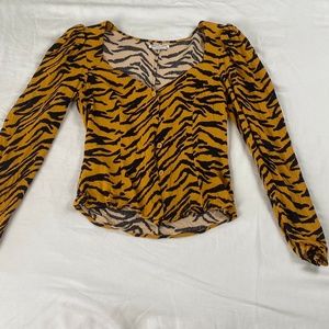 Reformation animal print blouse in XS